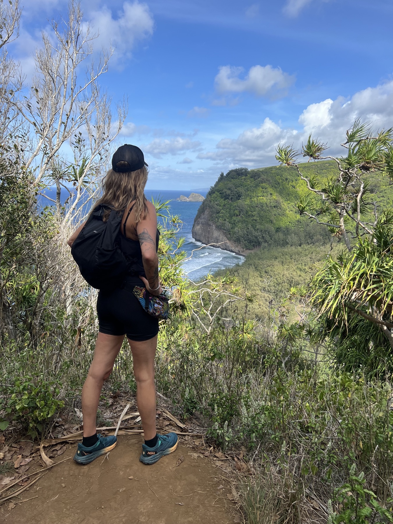 Lizzy East looking out over a coastal valley